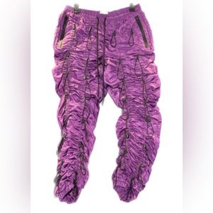 Purple parachute drawstring pants with tapered ankle